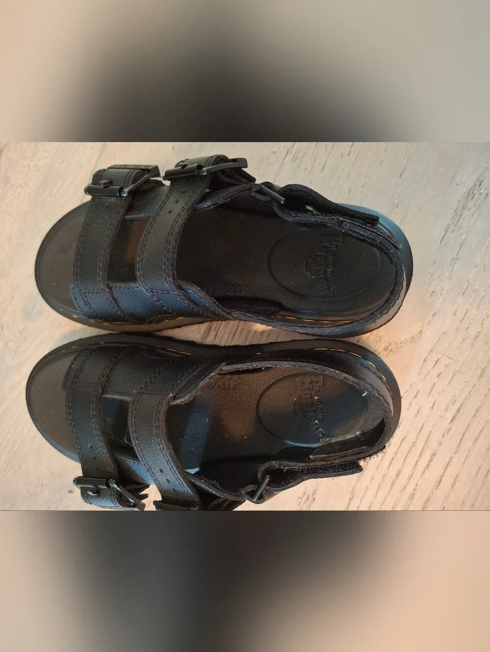 Kids Dr. Martens Black Leather Triple-Strap Sandals with Yellow Stitching